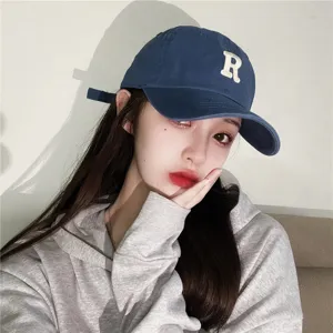 Classic washed cotton baseball cap with embroidered letter R design for casual wear.