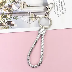 Silver braided leather keychain with metal lobster clasp and key ring for car keys.