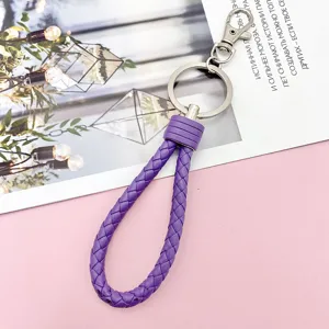 Purple braided leather keychain with metal ring detail close up shot for daily use accessories