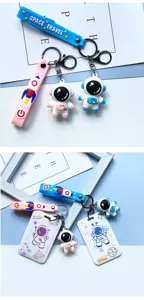 Cute astronaut keychain and sliding card holder set, space travel themed student school bus pass cover.