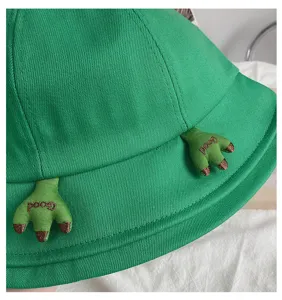 Green bucket hat detail view, cute claw embroidery, sun protection summer hat for women.