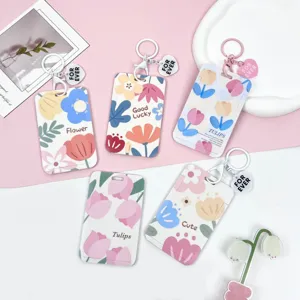 Portatarjetas deslizante transparente con diseño floral y llavero para tarjeta de estudiante.