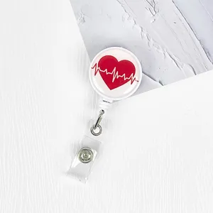 Retractable badge reel with heart ECG design, white ID card holder clip for nurses and doctors.