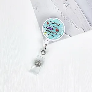 Retractable nurse badge reel with medical theme print, durable ID card holder key chain.