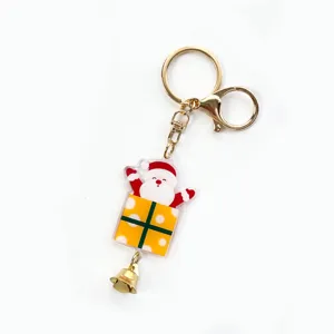 Cute Christmas Santa Claus acrylic keychain with golden keyring and bell pendant for gifts.