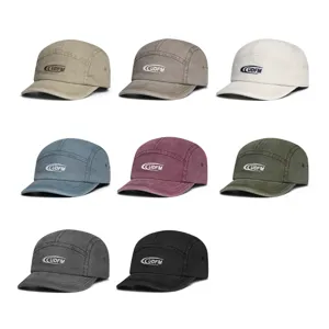 Close-up details of retro washed cotton short brim caps with stylish front embroidery.
