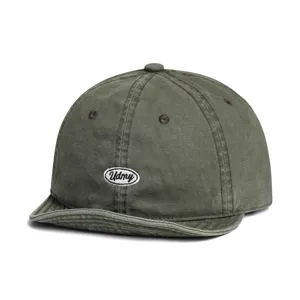 Detail view of the vintage washed cotton short brim baseball cap in military green with logo.
