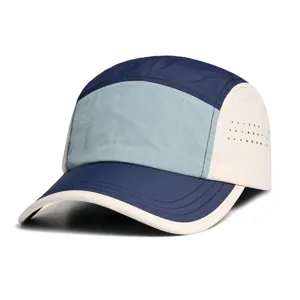 Detailed view of a colorblocked 5-panel quick-dry camper hat with side ventilation holes.
