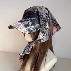 Detail view of the trendy snake print bandana baseball cap, stylish streetwear cap.
