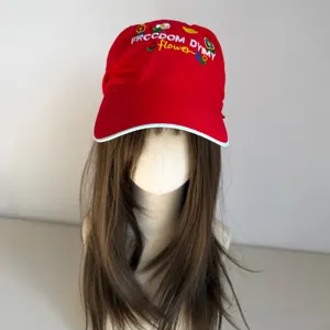 Red baseball cap with sweet flower embroidery, trendy casual wide brim duck tongue hat for women.