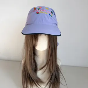 Sweet floral embroidery lavender baseball cap, wide brim sun hat closeup display.