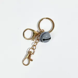 Porte-clés en métal doré avec cloche grise, accessoire pendentif de sac DIY pour tous.