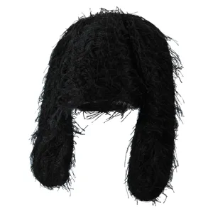 Black plush rabbit ear bomber hat, winter warm shaggy tassel trapper hat for streetwear style.