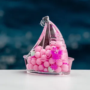 Porte-clés voilier transparent rempli de perles et de sequins comme pendentif de sac à dos