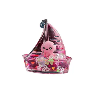 Joli porte-clés voilier sable mouvant liquide acrylique pendentif de sac avec poulpe rose.