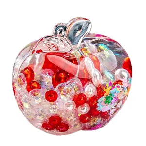 Pomme de Noël bouteille sable mouvant liquide décoration bureau cadeau transparent