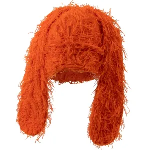 Orange fuzzy rabbit ear plush hat detail showing the fluffy shaggy texture and long ears.