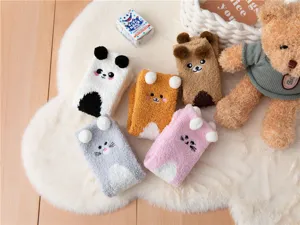 Cozy coral fleece fuzzy winter socks with cute animal designs, thick and warm for home sleeping.