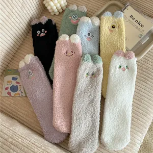 Thickened plush coral fleece cartoon cute warm floor socks for women cozy winter home wear.