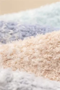 Nahaufnahme der soften Winter Korallenfleece Socken Textur kuschelig warme flauschige Ware