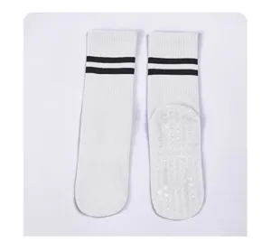 Silicone anti-slip yoga socks for women, mid-tube design, ideal for pilates and fitness.