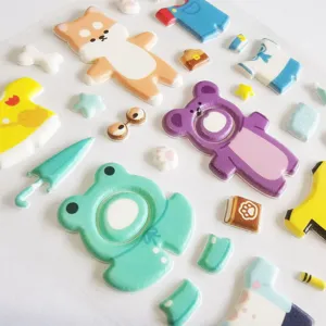 Detailed close-up of cute animal dress-up puffy foam stickers, perfect for DIY phone decor.