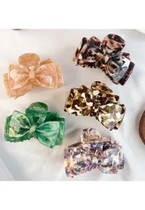 Elegant acetate bow hair claw clips set featuring multiple chic tortoise shell and mottled colors.