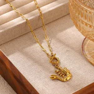 Stainless steel gold-plated paperclip chain necklace with a detailed lobster pendant detail shot.