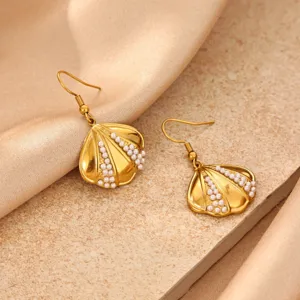 Exquisite 18k gold plated stainless steel shell drop earrings decorated with tiny white pearls.