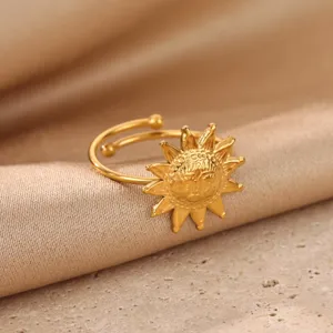 Adjustable stainless steel 18K gold plated celestial sun face ring for women and men.