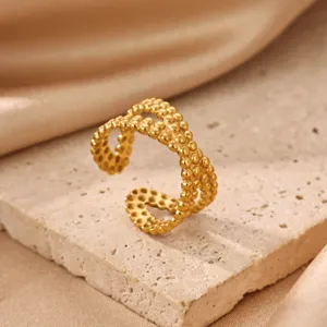 Close-up detail view of the gold-plated beaded open ring displaying its unique texture.