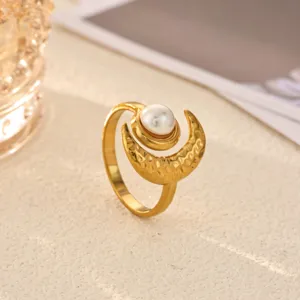 Exquisite gold stainless steel crescent moon pearl ring detail view, elegant women jewelry.