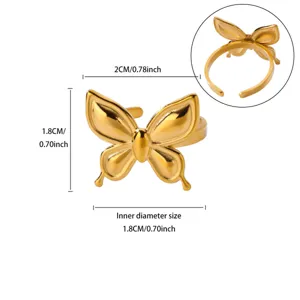 Gold stainless steel butterfly ring detail view showing precise dimensions and polished texture.