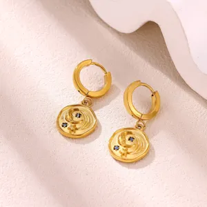 18k gold plated stainless steel zircon hoop earrings with delicate moon and star textured medallions.