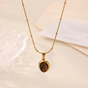 Stainless steel oval amber stone pendant necklace, minimalist beaded gold chain jewelry.