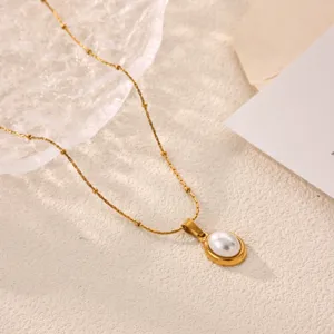 Minimalist gold titanium steel necklace featuring an elegant oval pearl pendant for women.