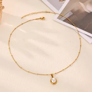 Minimalist gold titanium steel beaded chain necklace with elegant oval pearl pendant chic.