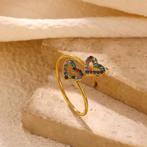 Gold-plated stainless steel double heart ring with vibrant colorful cubic zirconia stones.