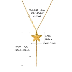 Detail view of gold long Y-chain necklace with textured star pendant and layered design.