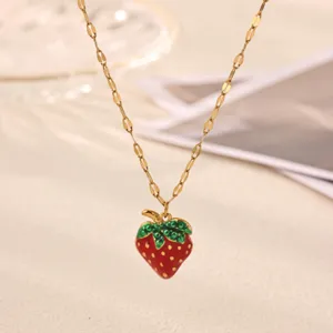Gold-plated stainless steel necklace featuring a cute enamel strawberry pendant style.