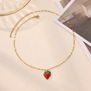 Gold-plated stainless steel strawberry pendant necklace with retro red green drip oil, detail shot.