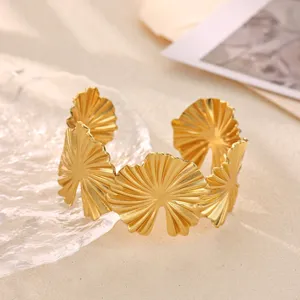 Gold metallic open bangle bracelet featuring stylish pleated fan geometric design for women chic.