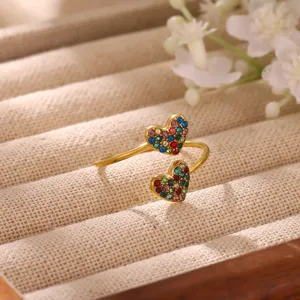 Gold double heart open ring featuring colorful micro-set cubic zirconia stylish fashion jewelry.