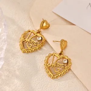 Chic 18k gold plated stainless steel heart Mama zircon drop earrings detail view.