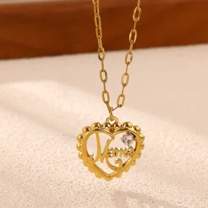Stainless steel 18K gold plated heart MOM zircon pendant necklace detail close-up view.