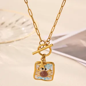 Gold stainless steel ocean series necklace featuring a cute crab starfish enamel square pendant.