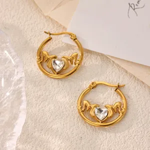 Close-up of gold stainless steel heart mom hoop earrings with sparkling zircon crystal detail.