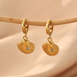 Close-up detail view of elegant gold stainless steel shell earrings with blue zircon.