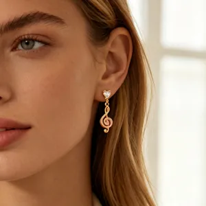 Gold-plated treble clef earrings with heart rhinestone stud, elegant jewelry for women.