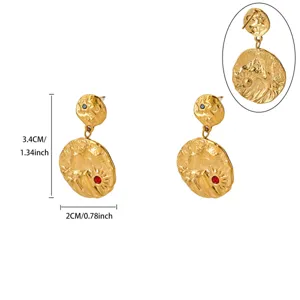 Detailed view of trendy 18k gold plated sun and moon drop earrings with colorful rhinestone.